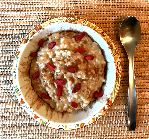 A bowl of baked oats with goji berries ready to enjoy.
