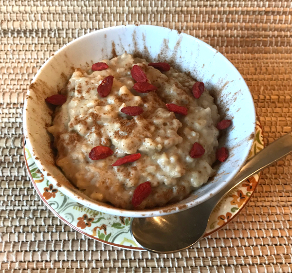 bowl of gluten-free, sugar-free baked oats with goji berries