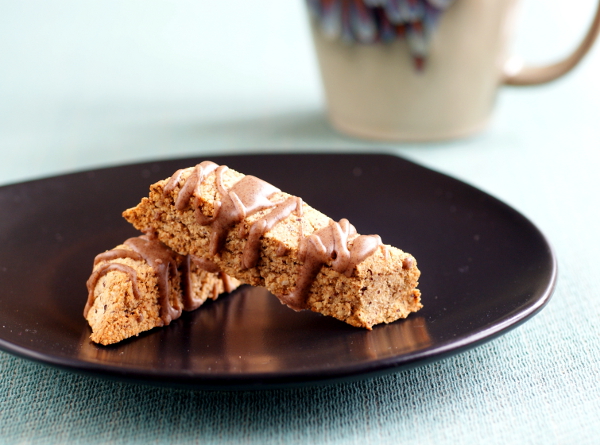 A grain-free, sugar-free, candida diet-friendly and vegan Hazelnut Biscotti with Cinnamon Glaze that anyone can love. | rickiheller.com