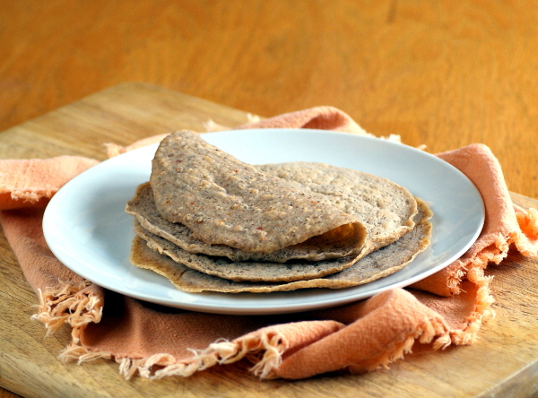 Plate piled with soft gluten free tortillas